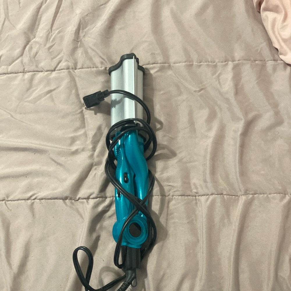 Teal and Silver Hair Styling Tool
